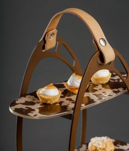 Modern high tea stand in horse shoe design