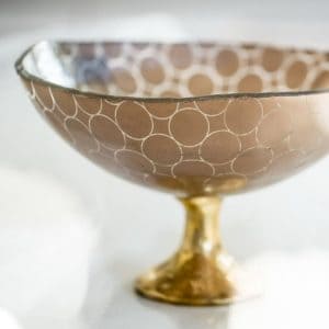 Elegant footed bowl and centerpiece bowl crafted in glass for luxury room settings by MyGlassStudio.