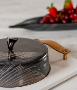 Marble serving tray with welcome amenities in a designer hotel suite MyGlassStudio